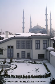  A modern view of the house of Rida Big, the residence of Bahá’u’lláh in Adrianople for one year. The Mosque of Sultan Salim is in the background.
