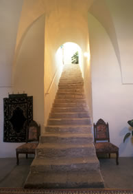 During the time of Bahá’u’lláh, this staircase, which leads to the living quarters at the Mansion of Mazra‘ih, was open to the outside. Sometime later, it was enclosed as shown.