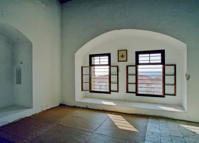 A view of the cell of Bahá’u’lláh after its restoration in 2004.